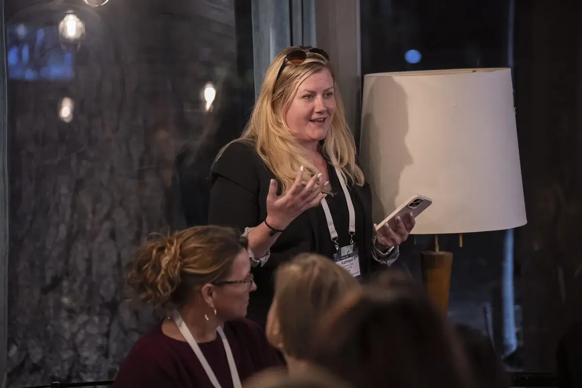 AFT Women in FinTech 2023 — speaker addressing a group of seated attendees at the event